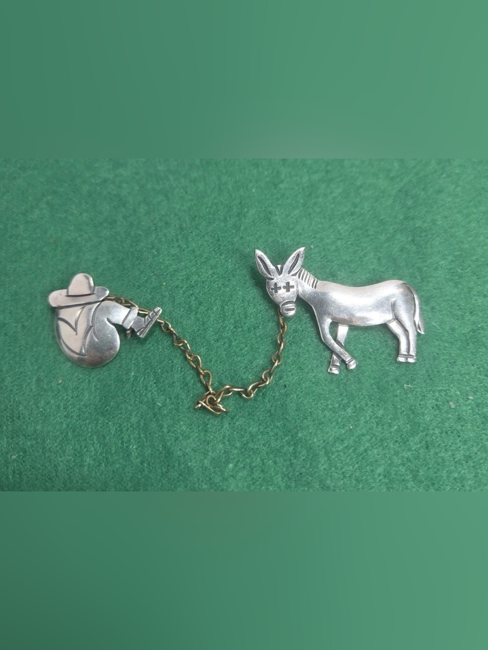 Sterling silver siesta man with donkey pin- signed- 925